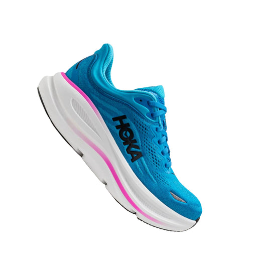 Blue running shoe with a white midsole, pink accent stripe, and black side logo.
