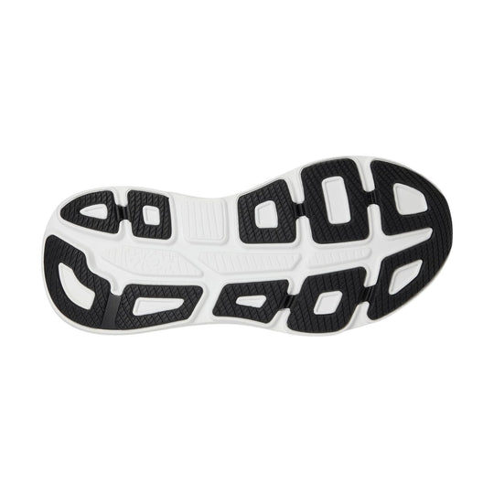 Black and white running shoe outsole with segmented traction pods and HOKA branding