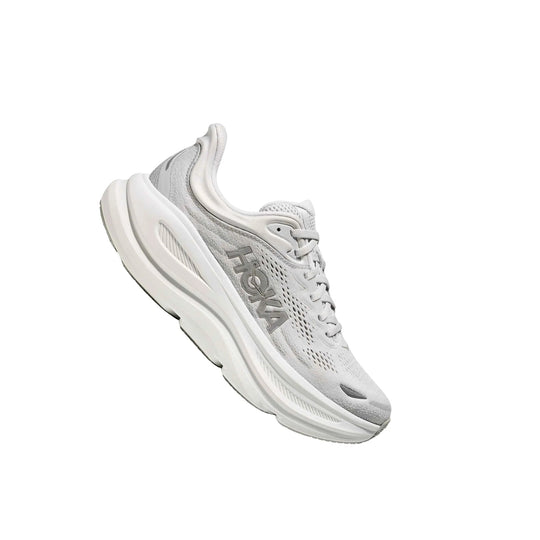 Light gray HOKA running shoe with thick cushioned sole, mesh upper, and lace-up closure