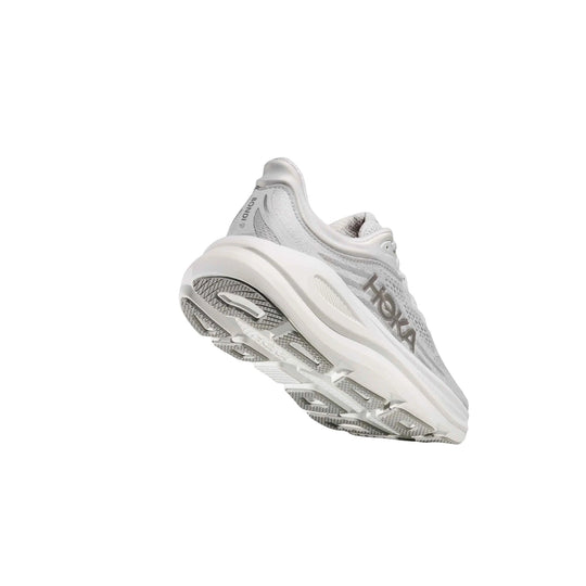 White and light gray running shoe shown from the sole side with HOKA branding.
