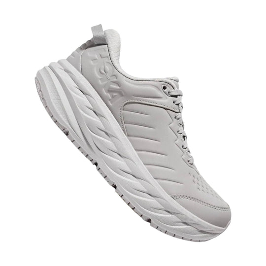 Light gray slip-resistant athletic shoe with embossed side logo and thick cushioned sole