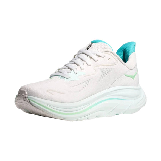 White running shoe with aqua collar and heel, lace-up front, and thick cushioned sole