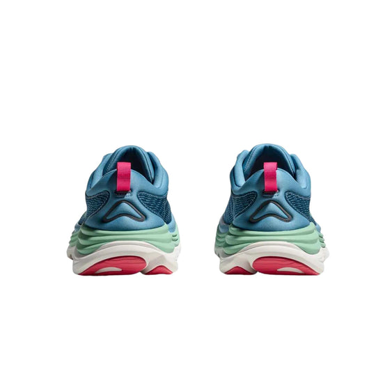 Pair of blue athletic running shoes with mint green midsoles, white soles, and pink heel loops, rear view