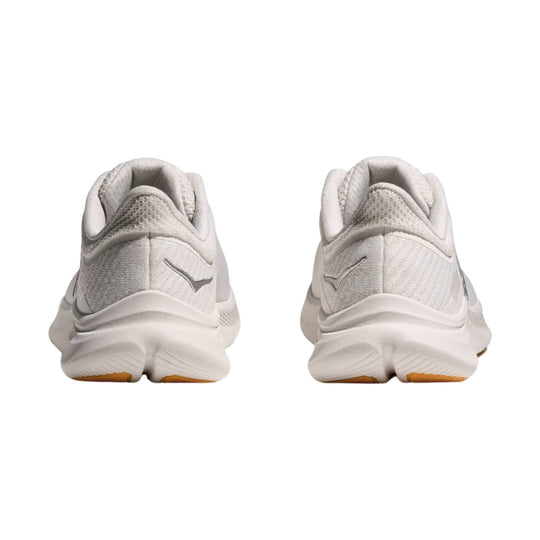 Pair of white mesh athletic sneakers shown from the back