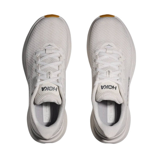 Pair of white athletic running shoes with mesh uppers, white laces, and gray soles, shown from above