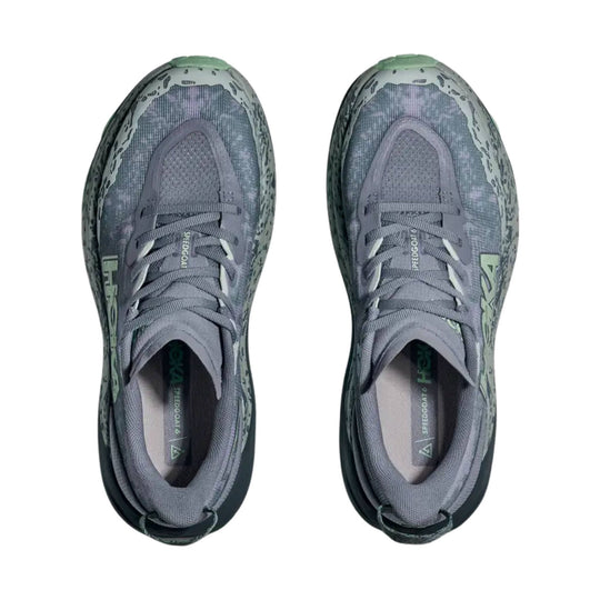 Pair of gray trail running shoes with laces, top view