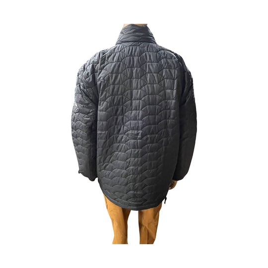Black quilted puffer jacket shown from the back on a mannequin, with a high collar and long sleeves