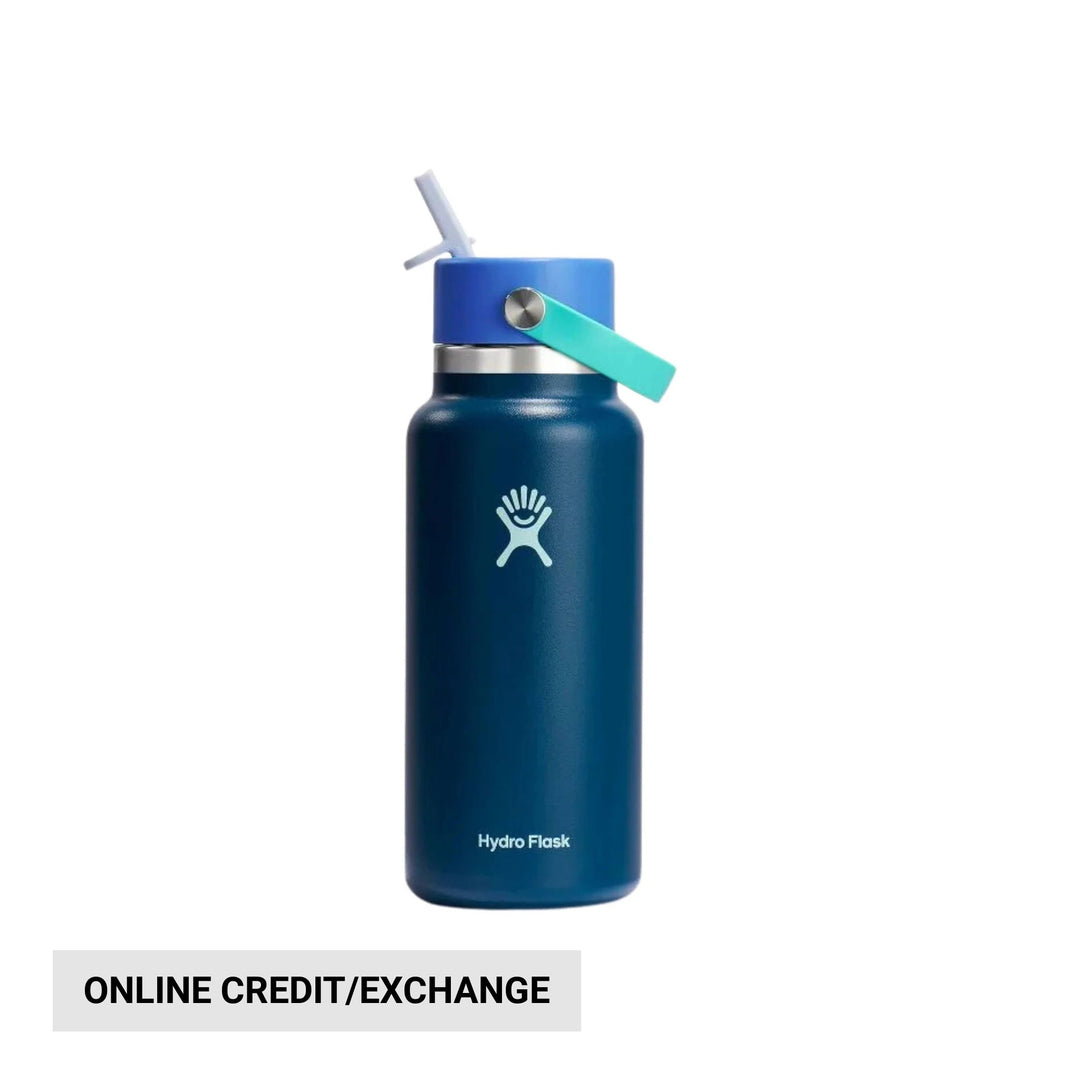 Blue insulated water bottle with straw lid and carry strap, labeled Hydro Flask