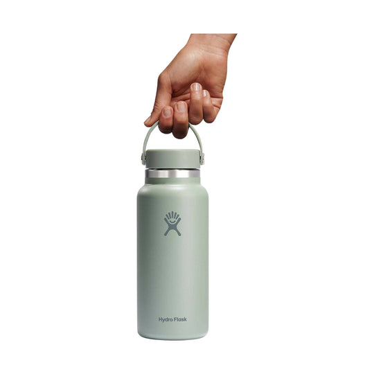 Light sage insulated water bottle with carry loop handle and Hydro Flask logo