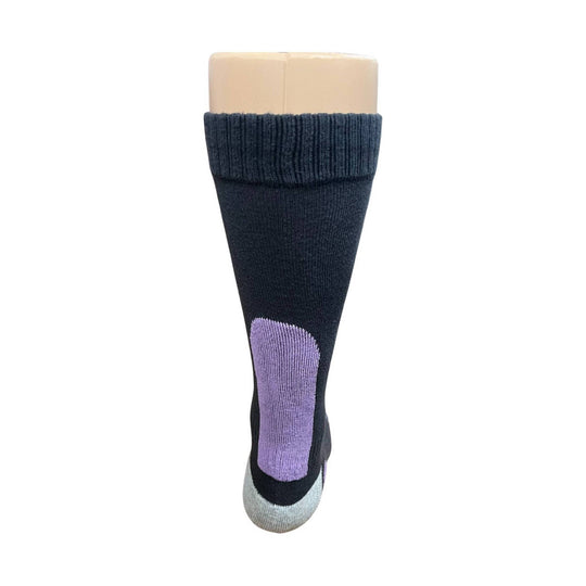 Black crew sock on a mannequin leg with a purple heel and gray toe