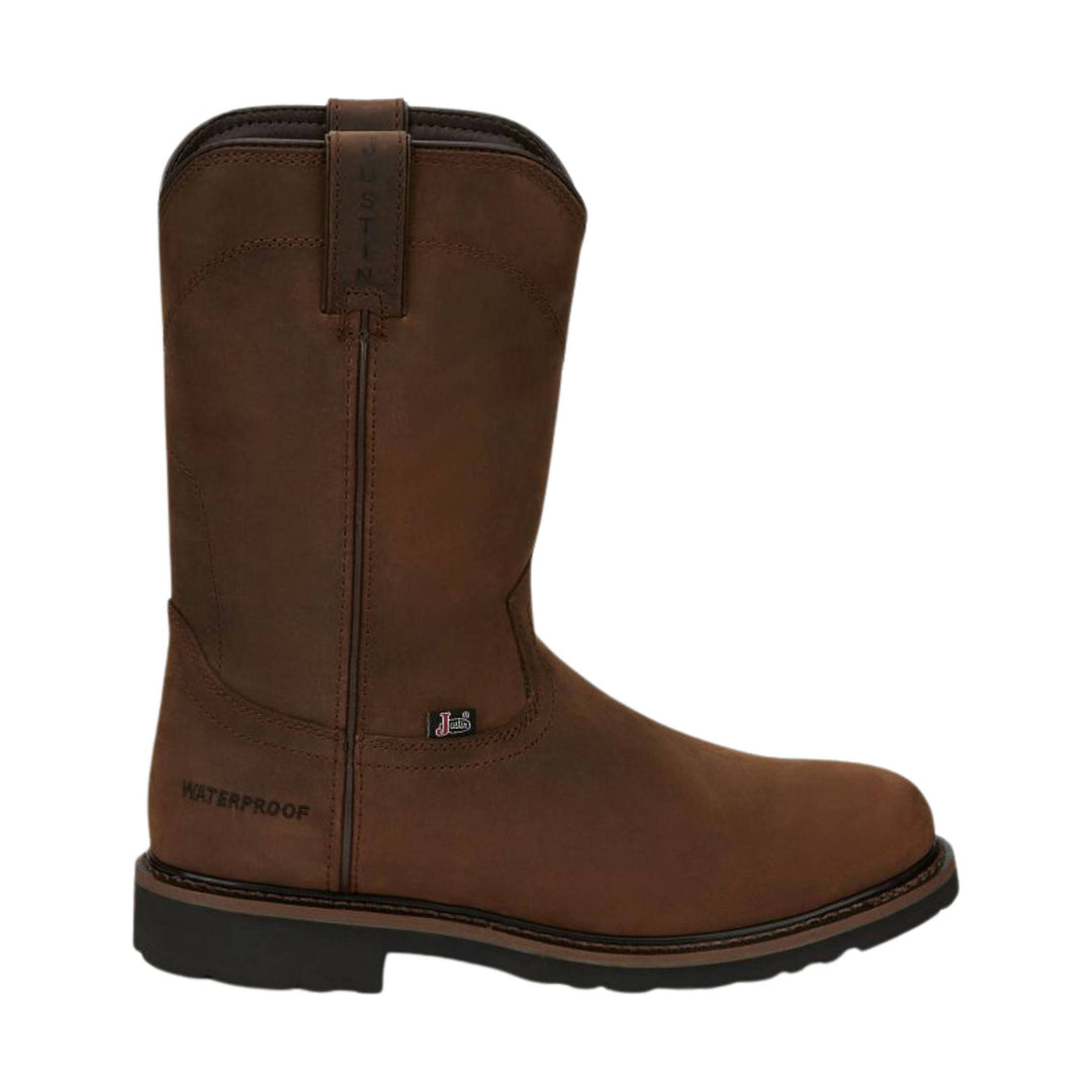Brown waterproof pull-on work boot with a black sole and visible side zipper