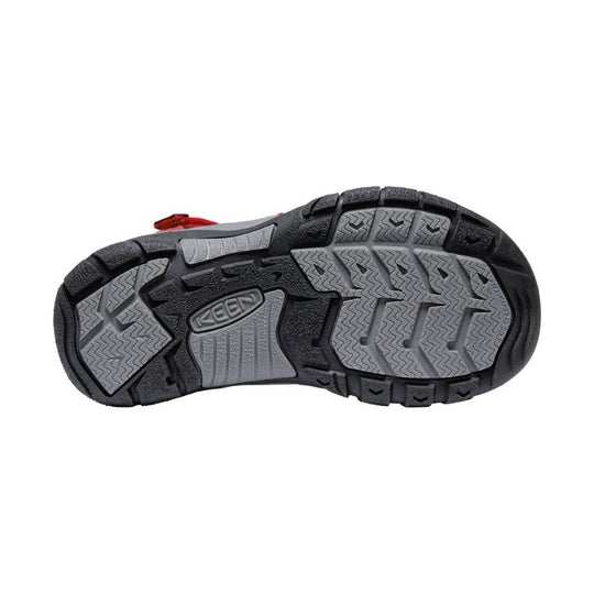 Close-up of a sandal sole with KEEN branding on a white background