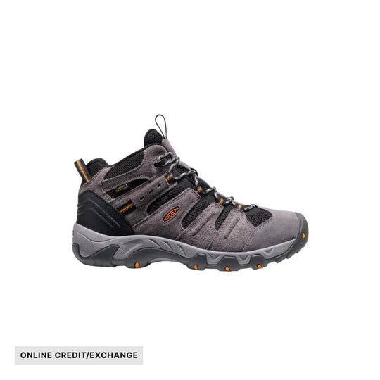 Gray and black mid hiking boot with orange accents and a rugged sole