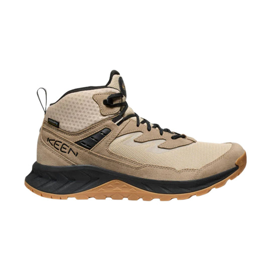 Tan and black mid-top hiking boot with mesh panels, black laces, and a gum sole