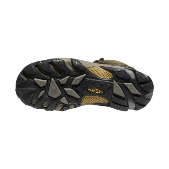 Hiking boot outsole with black and gray lugs and visible KEEN logo