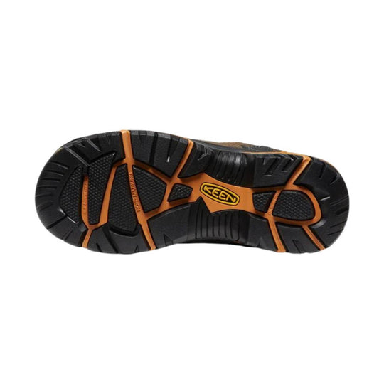 Black rubber work shoe outsole with orange accents and KEEN logo