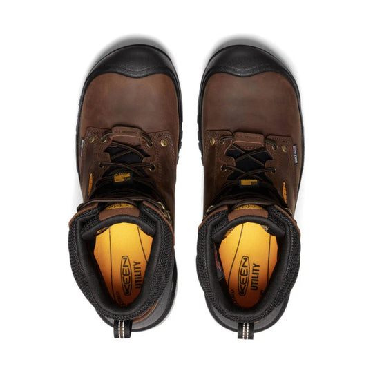 Brown and black insulated work boots shown from above with black toe caps and yellow insoles