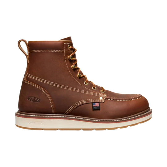 Brown leather lace-up work boot with white wedge sole and pull tab