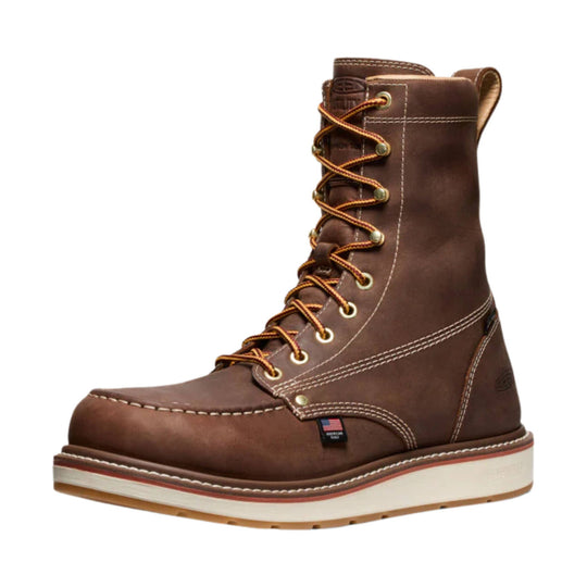 Brown lace-up work boot with a white wedge sole and visible stitching