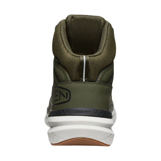 Olive high-top work boot with a white sole and black heel band, shown from the back