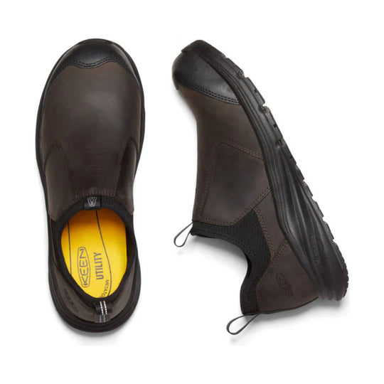 Brown slip-on work shoes with black soles, shown top and side views, with yellow insoles and pull tabs