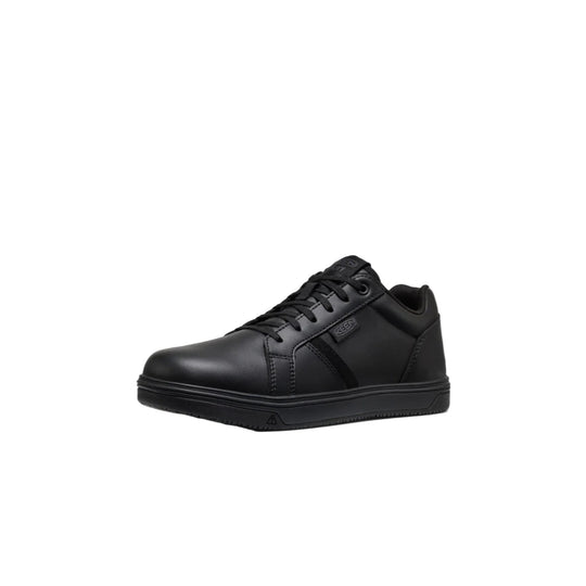 Black low-top work shoe with lace-up front and thick rubber sole