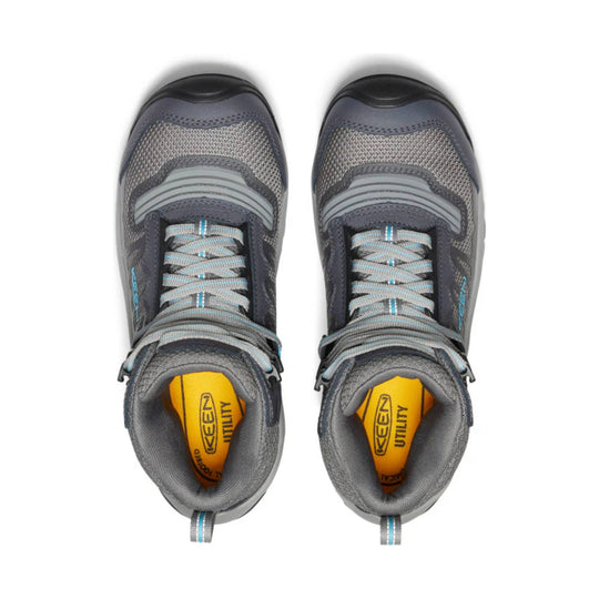 Pair of gray mid-height work boots with black toe caps, gray laces, and yellow insoles