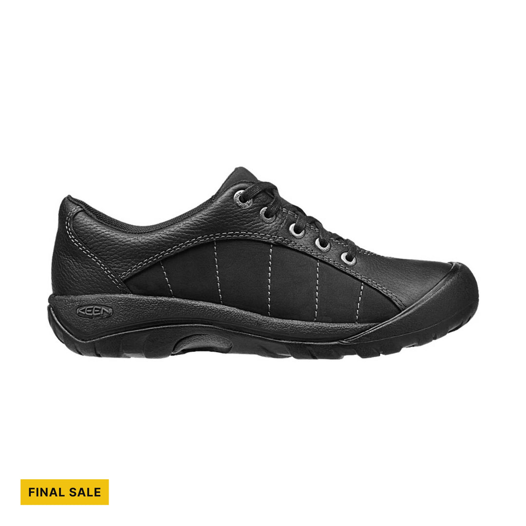 Black leather shoe with KEEN logo on a white background