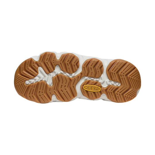 Brown and white rubber sandal outsole with multi-directional tread and a KEEN logo