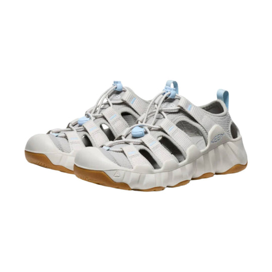 Light gray closed-toe hiking sandals with bungee laces, side cutouts, and gum outsoles