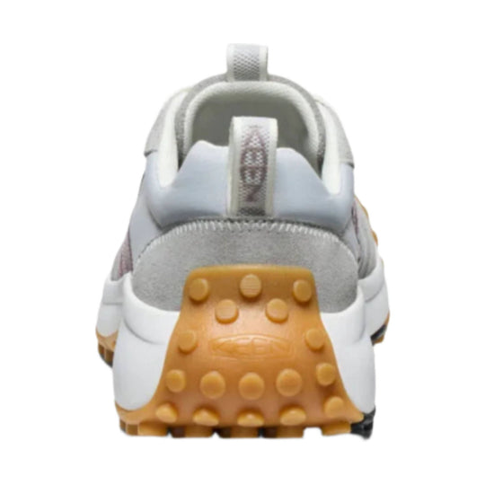 Back view of a gray and white hiking shoe with tan lugged outsole