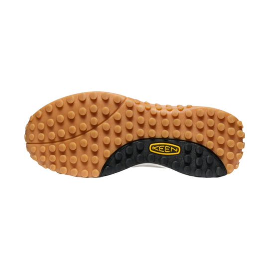Tan and black shoe outsole with raised tread and KEEN logo