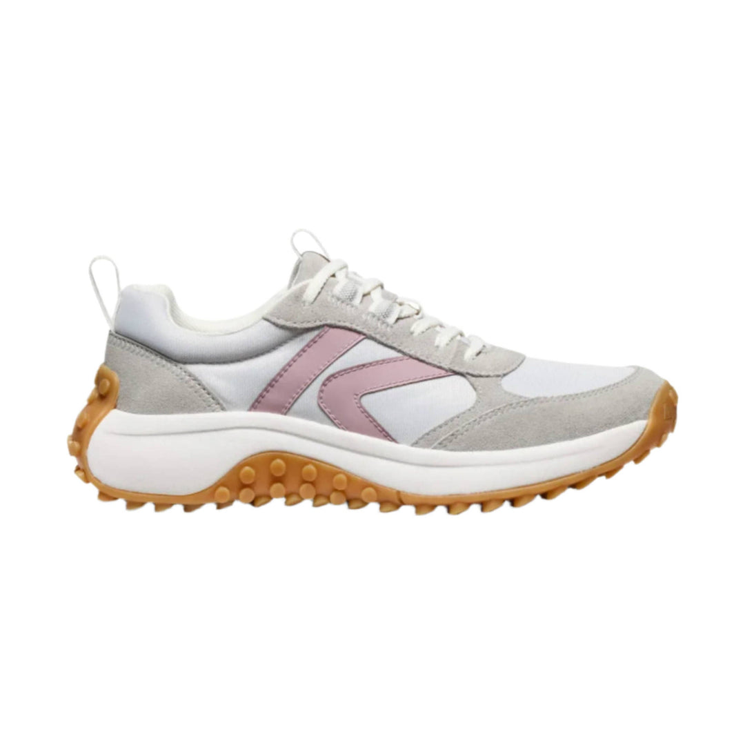 White and gray sneaker with pink side accent and gum tread outsole, side view