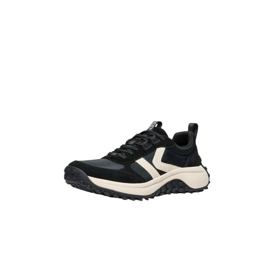 Black lace-up sneaker with white side logo, cream midsole, and rugged lug outsole