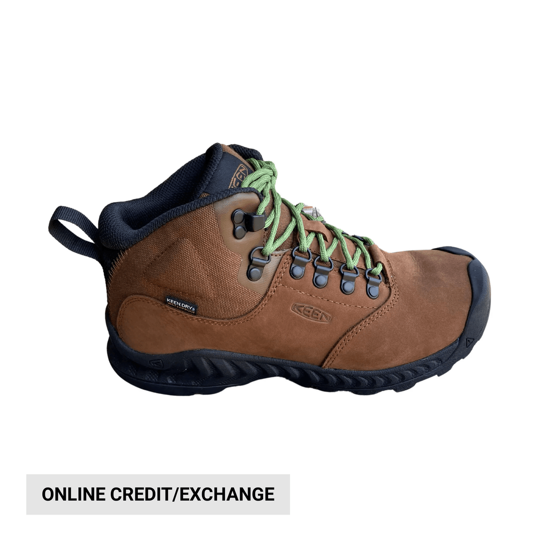 Brown mid-height hiking boot with black sole, green laces, and visible KEEN branding