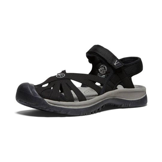 Black closed-toe hiking sandal with cutout straps, a heel strap, and a gray cushioned sole