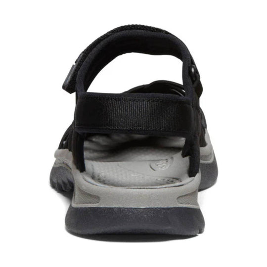 Black and gray closed-toe sandal with a padded heel strap and adjustable hook-and-loop closure