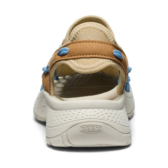 Closed-toe beige and brown sandal with blue bungee cords, shown from the back