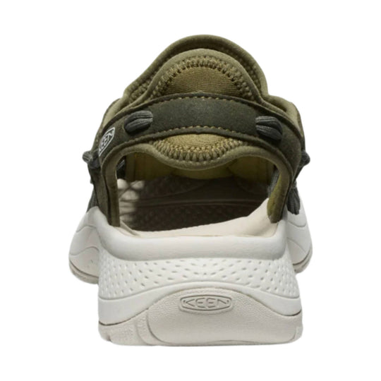 Olive and white closed-toe sandal with bungee laces, side cutouts, and KEEN logo on the heel