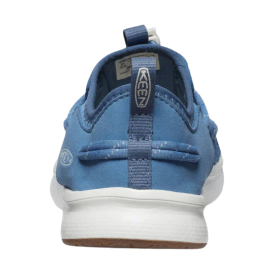 Blue closed-back sneaker sandal with bungee heel loop and white sole