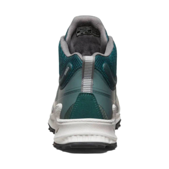 Rear view of a teal and gray hiking boot with a padded collar, white midsole, and black treaded outsole