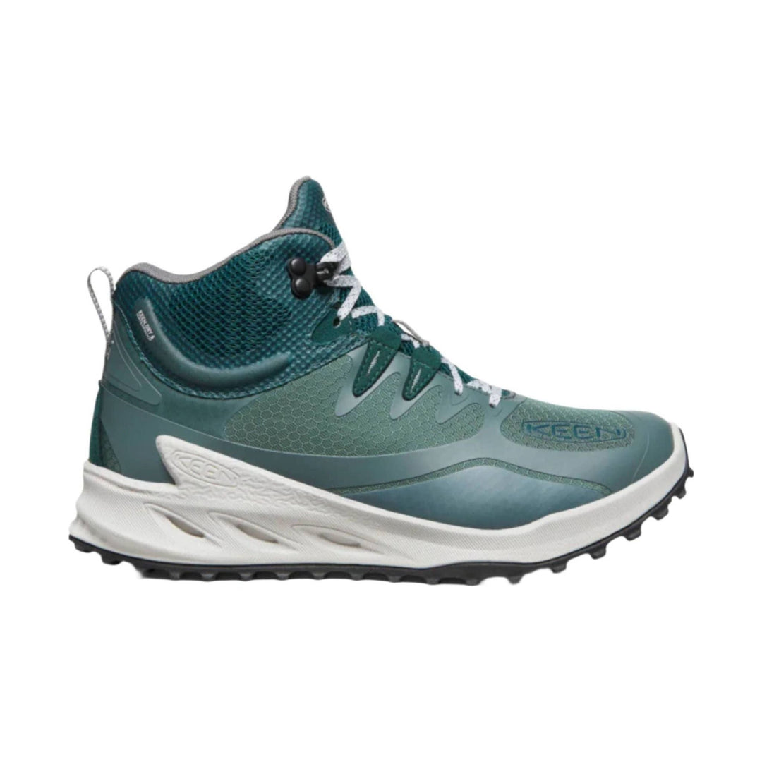 Teal and gray waterproof hiking boot with white sole and black lug outsole