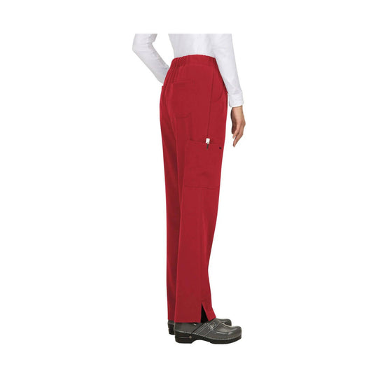Red scrub pants with elastic waist, side cargo pockets, and side slits at the hem, shown on a model with a white top.