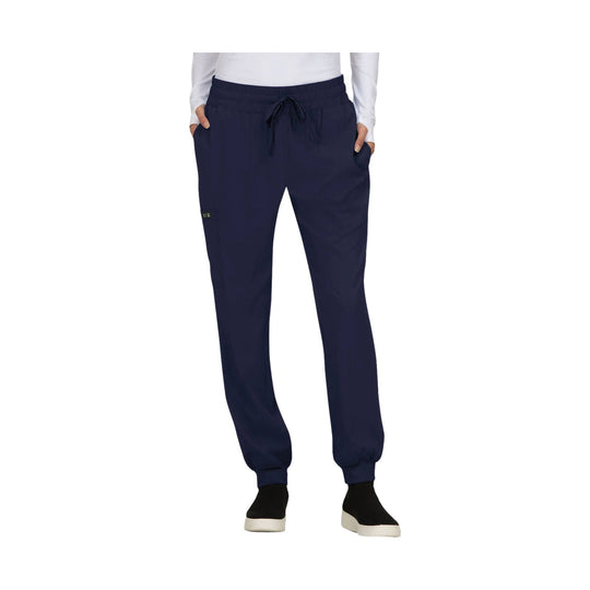 Navy jogger pants with elastic waistband, drawstring, side pockets, and cuffed ankles
