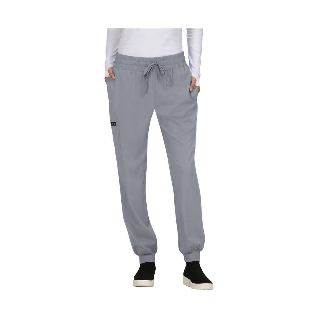 Light gray jogger scrub pants with drawstring waist, cargo pocket, and ribbed ankle cuffs