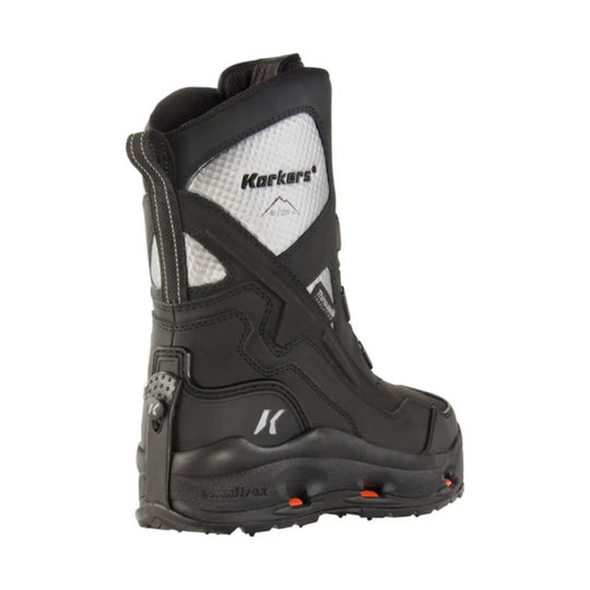 Black winter snow boot with white mesh panels, orange tread inserts, and side strap detail