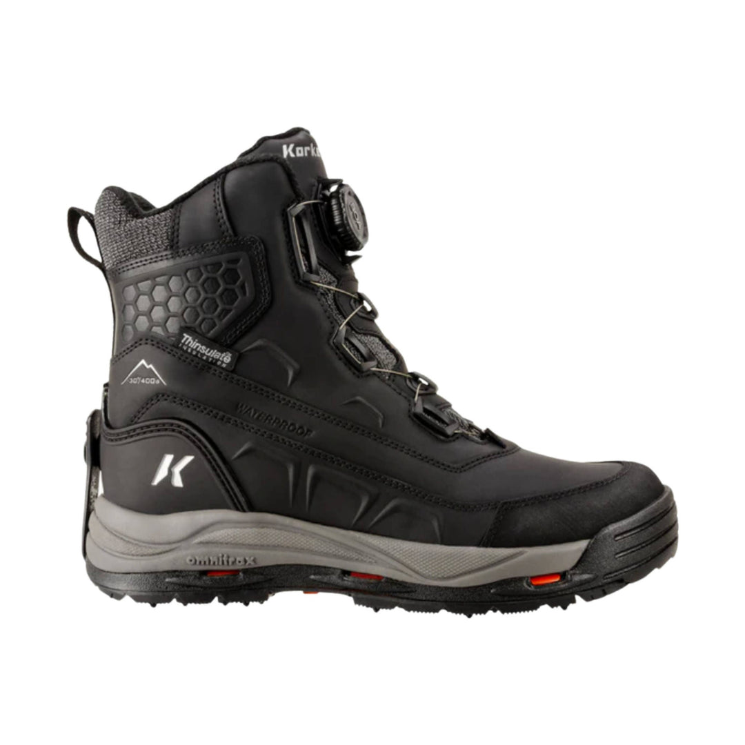 Black insulated winter boot with dial closure, side zipper, and gray lugged sole