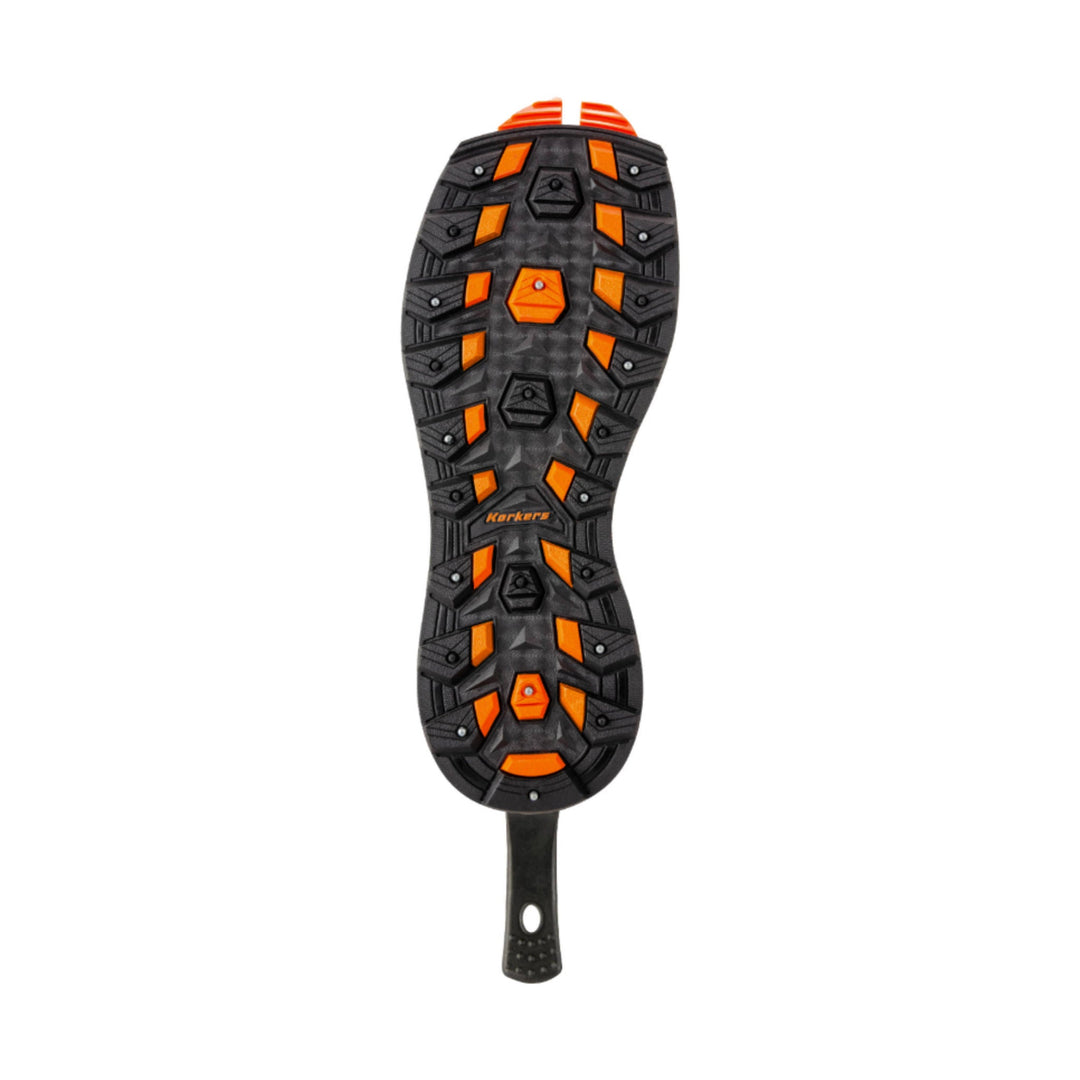 Black rubber boot sole with orange traction inserts and stud slots, shown from below
