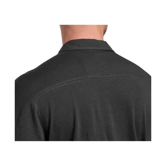 Black short-sleeve polo shown from the back with curved shoulder stitching and a folded collar