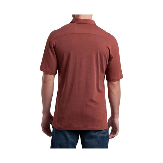 Rust-colored short-sleeve polo shirt shown from the back